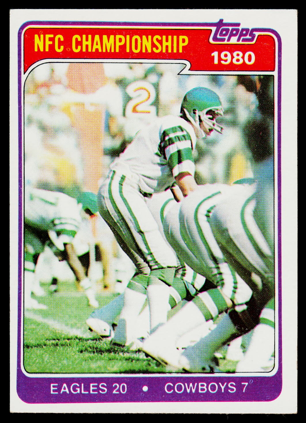 A vintage 1980 Topps NFL trading card showing an NFC Championship game between the Eagles and Cowboys. The card features a purple border with red and yellow text at the top and bottom, and a central action photo of football players in green and white uniforms.