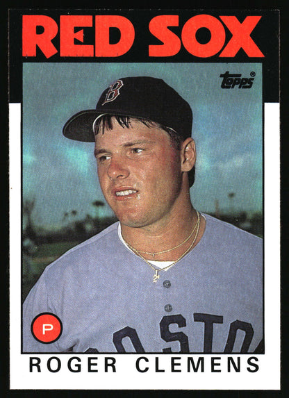 A vintage Topps baseball trading card featuring Roger Clemens of the Boston Red Sox. The card has a black border with 'RED SOX' in bold red letters at the top, a portrait of Clemens in a blue-gray Boston uniform and black cap, and his name printed at the bottom.