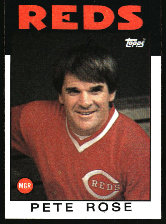 A vintage Topps Pete Rose baseball trading card featuring a portrait of Pete Rose in a red Cincinnati Reds jersey, with 'REDS' in large red letters at the top and 'PETE ROSE' printed at the bottom.