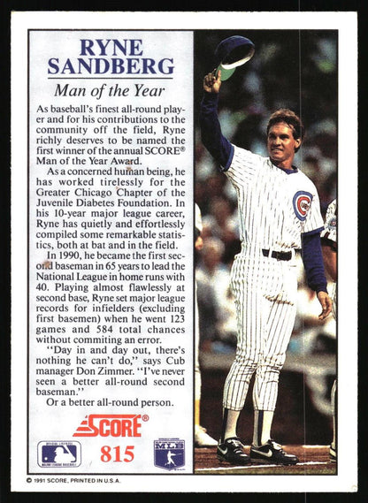 A vintage 1991 Score baseball trading card featuring Ryne Sandberg, labeled 'Man of the Year.' The card includes a large biographical text block on the left and a photo of Sandberg in a Chicago Cubs uniform holding a baseball cap on the right.