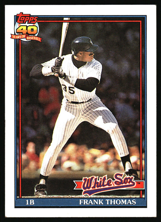 A vintage Topps  baseball card featuring Frank Thomas of the White Sox  wearing a white pinstripe uniform and black helmet.