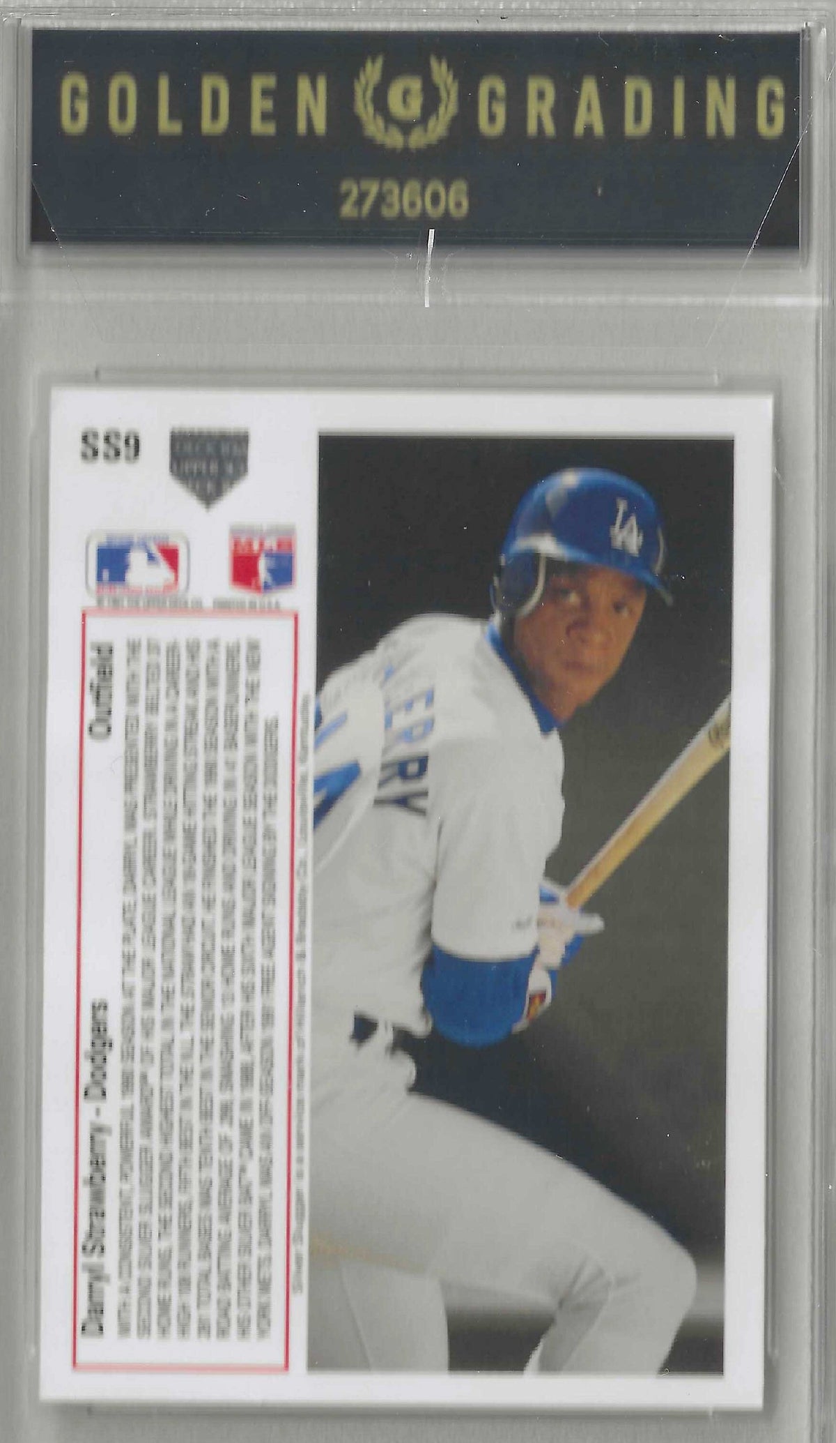 A baseball trading card featuring Darryl Strawberry in a white Los Angeles Dodgers uniform, with team logos and player statistics printed on the left side.
