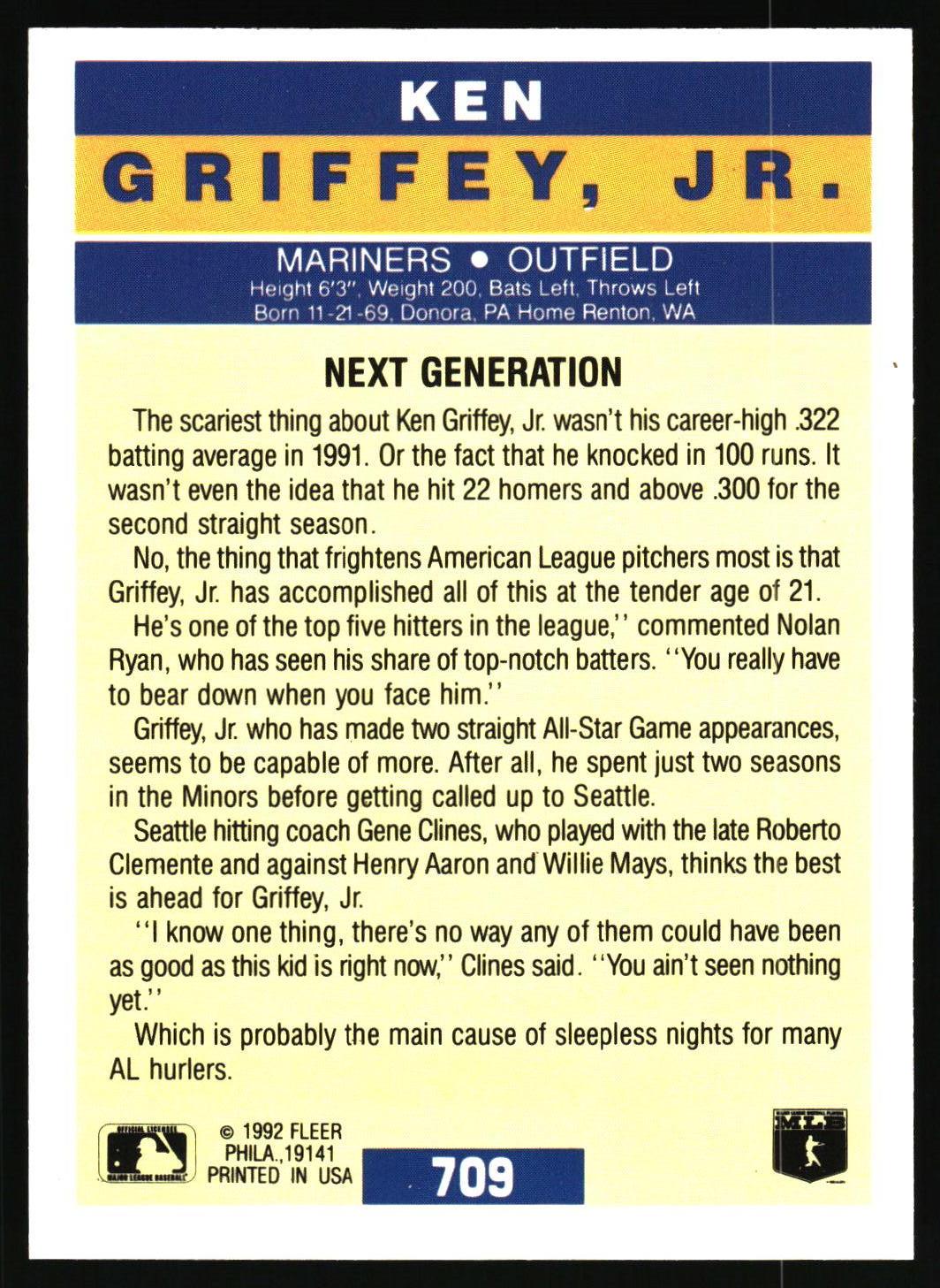 Back of a 1992 Fleer Ken Griffey, Jr. trading card showing player statistics, biographical text, and a yellow-and-blue header on a cream background.