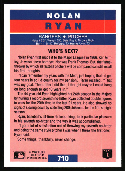 Back of a 1992 Fleer baseball trading card featuring player profile for Nolan Ryan, with biographical text, team logos, and a pink-to-red gradient background.