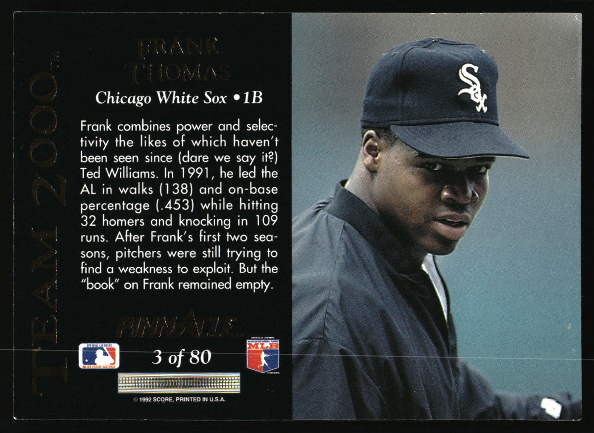 Back of a 1992 Topps baseball trading card featuring player information for Frank Thomas and a photo of him in a Chicago White Sox cap looking down.