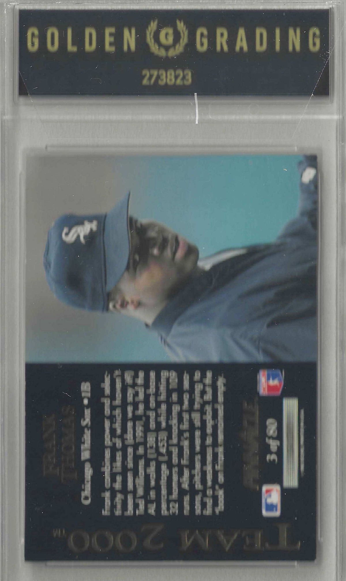 Back of a 1992 Topps baseball trading card featuring player information for Frank Thomas and a photo of him in a Chicago White Sox cap looking down.