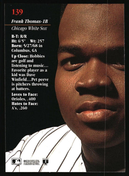 A baseball trading card featuring a close-up portrait of Frank Thomas, a Chicago White Sox player. The left side contains biographical text including his birth details and career stats, with a black background and white text.