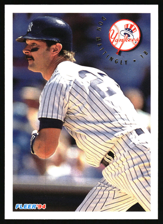 A vintage New York Yankees baseball trading card featuring Don Mattingly in a pinstripe uniform and helmet, with the Yankees logo and 'FLEER 94' text on the card.