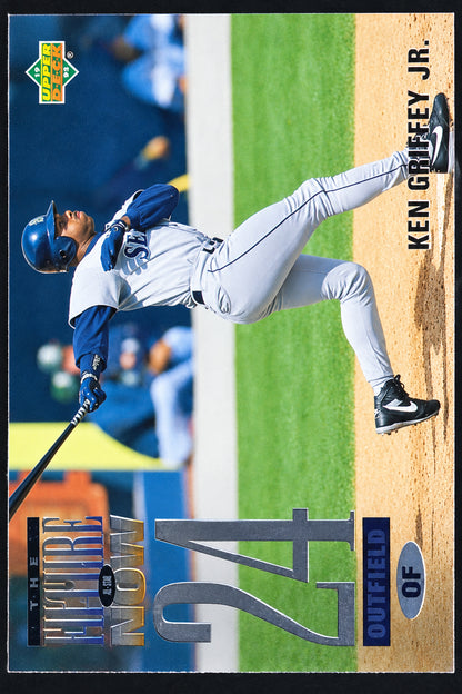 A Ken Griffey Jr. baseball trading card featuring a dynamic action photo of him batting, with his name printed vertically on the right side and a dark green and black card border.