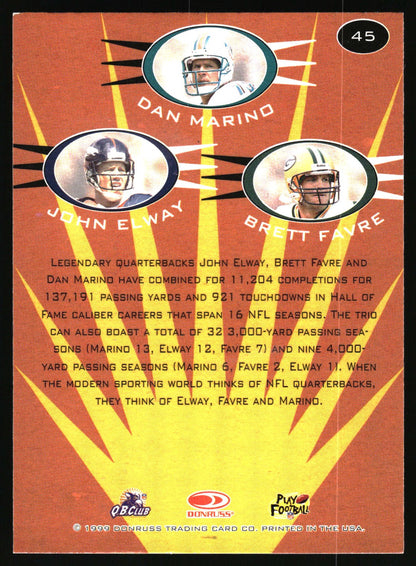 A vintage 1999 trading card back featuring Dan Marino, John Elway, and Brett Favre. The card has a textured orange-brown background with yellow sunburst rays, circular player portraits, and black text detailing their NFL career statistics.