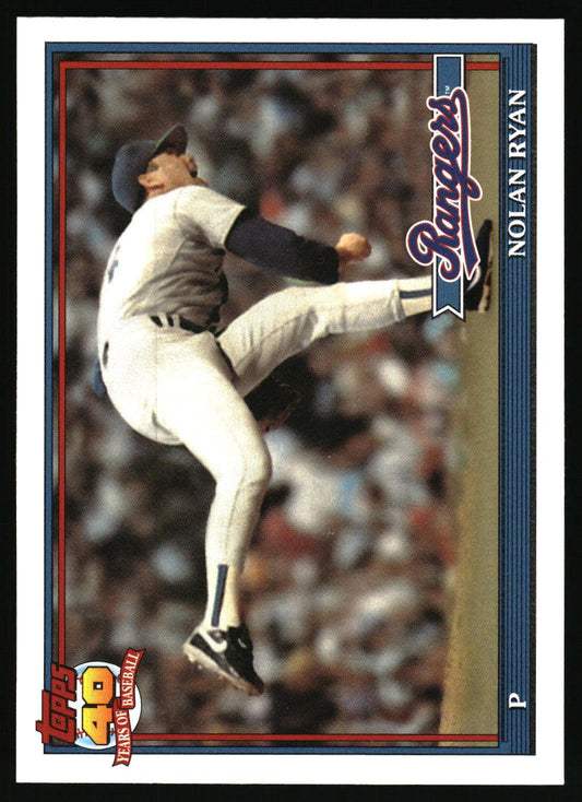 A vintage Topps baseball trading card featuring Nolan Ryan in a Rangers uniform mid-pitch, with the Topps 40 Years of Baseball logo and player name printed on the card.