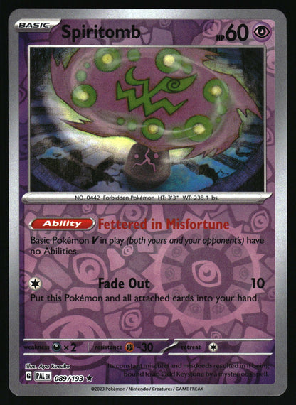 Pokémon trading card featuring Spiritomb with purple and green design