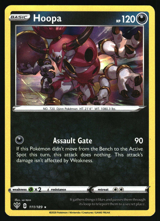 A Pokémon trading card featuring Hoopa, a red and white armored creature. The card has a yellow border, black and dark gray text area, and shows the attack name 'Assault Gate' with a power of 90.
