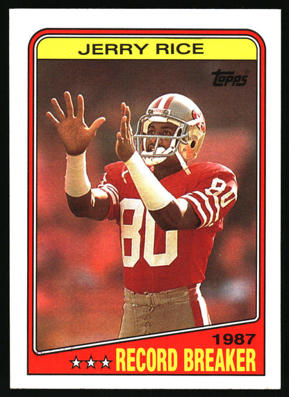 A vintage 1987 Topps Jerry Rice football trading card, featuring a photo of Rice in a red San Francisco 49ers jersey with the number 80, set against a red background with a yellow border.