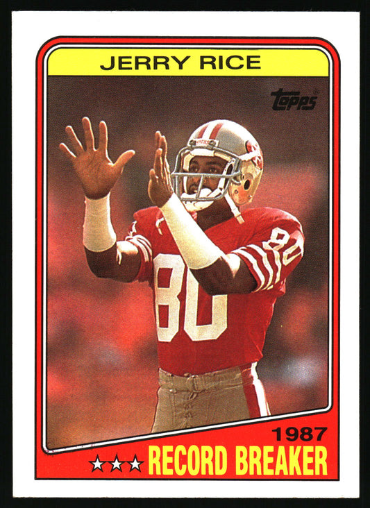 A vintage 1987 Topps Jerry Rice football trading card, featuring a photo of Rice in a red San Francisco 49ers jersey with the number 80, set against a red background with a yellow border.