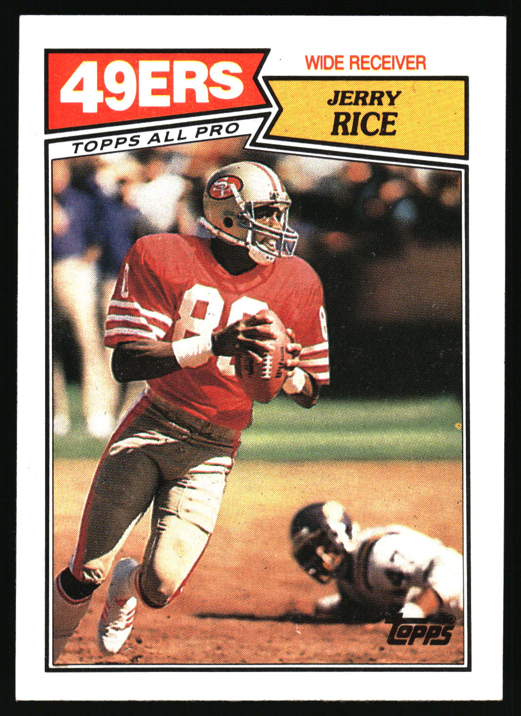 A vintage Topps All Pro football trading card featuring Jerry Rice of the San Francisco 49ers. The card shows a photo of Jerry Rice in his red and gold uniform running with a football, with '49ERS', 'JERRY RICE', and 'TOPPS ALL PRO' printed on the white border.