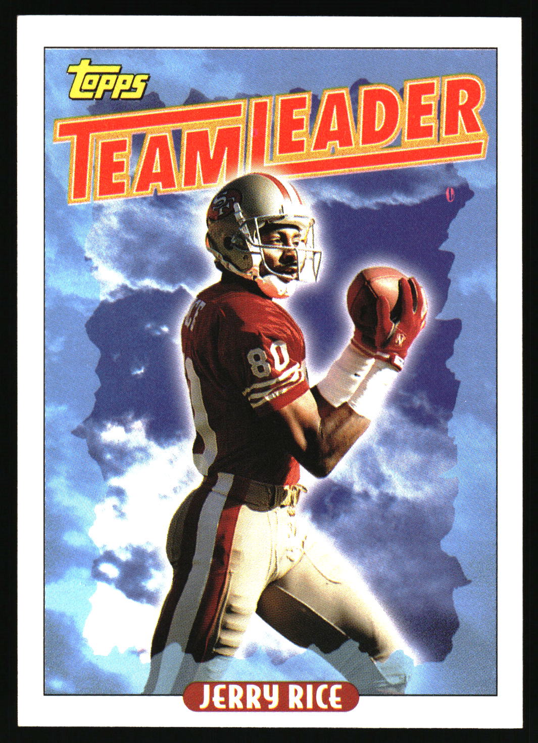 A vintage Topps Teamleader football trading card featuring player Jerry Rice in a red and white uniform against a blue sky background with a white border.