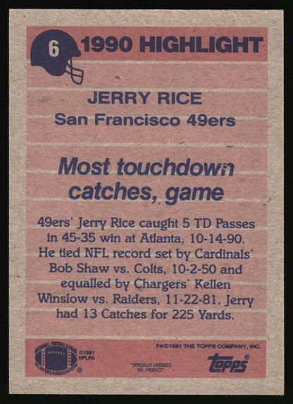 A vintage 1990 Topps football trading card back featuring Jerry Rice, San Francisco 49ers, highlighted with a dusty pink background and dark blue text and graphics.