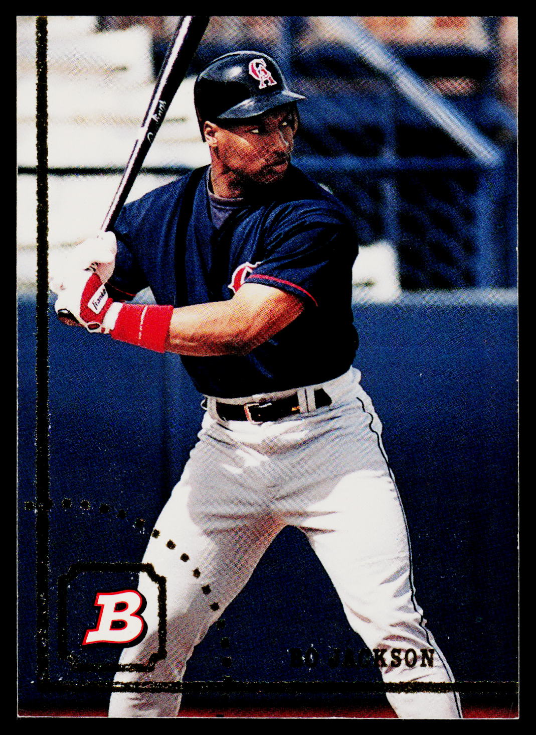 A baseball trading card featuring player Tom Jackson in a batting stance, wearing a navy blue Boston Red Sox uniform with white pants and a navy helmet with a red 'B' logo. The card has a black border with a red 'B' logo in the bottom left corner and 'TOM JACKSON' printed at the bottom right.