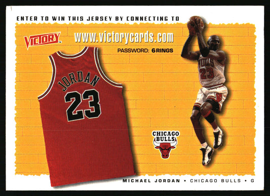 A vintage Michael Jordan Chicago Bulls trading card featuring a yellow basketball court background, a photo of Jordan in a white Bulls jersey, a red jersey graphic with the number 23, and text including 'Michael Jordan', 'Chicago Bulls', and 'Victory'.