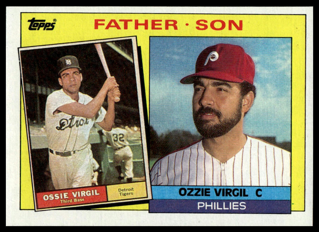 A vintage Topps baseball trading card featuring Ozzie Virgil, with a yellow border, a photo of him batting on top, and a close-up portrait of him wearing a red cap below. The card includes the text 'FATHER SON' and 'Topps'.