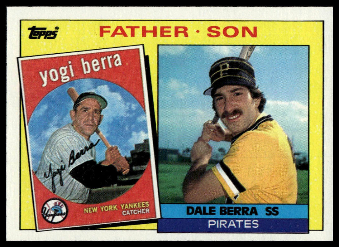 A vintage Topps baseball trading card featuring Yogi Berra and Dale Berra, labeled 'Father Son'. The card has a yellow border, a red header, and a blue footer, with printed photos of the two baseball players.