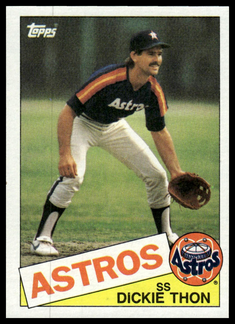 A vintage Houston Astros baseball trading card featuring player Dickie Thon in a navy, orange, and white uniform, with the Topps logo in the upper left and player name at the bottom.