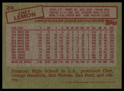 The back of a vintage 1969 Topps baseball card featuring Chet Lemon, with biographical text and a batting record table printed in red and black on a tan background.