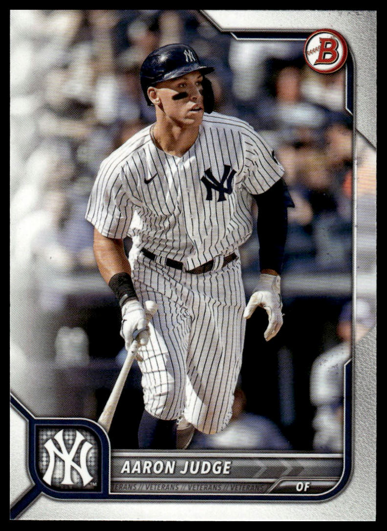 A baseball trading card featuring Aaron Judge in a New York Yankees pinstripe uniform, with the Yankees logo, a Nike swoosh, and a red circular 'B' mark visible on the card.