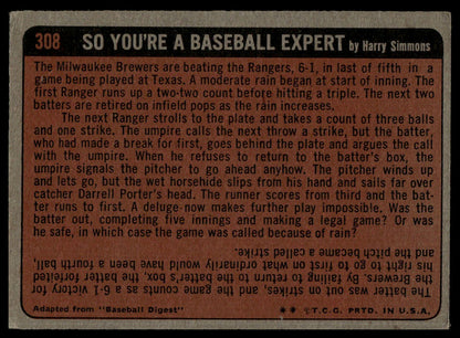 Vintage baseball trading card back with printed text, titled 'SO YOU'RE A BASEBALL EXPERT' by Harry Simmons, showing a tan background with black text and a dark border.