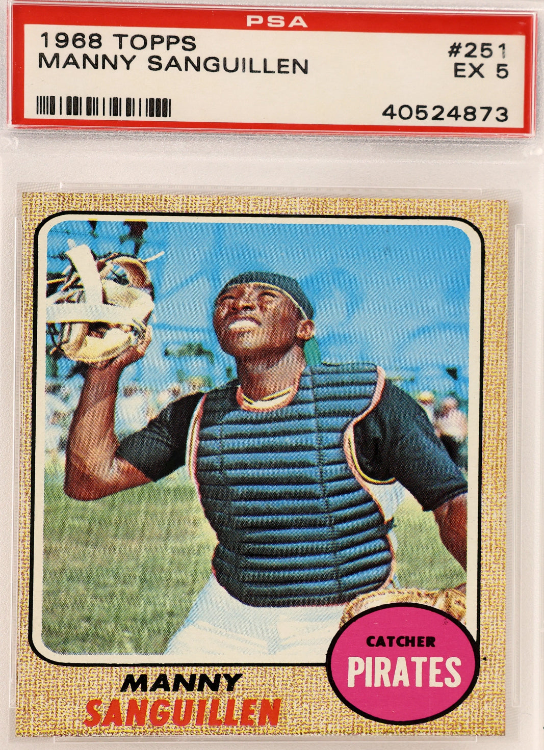A PSA graded 1968 Topps baseball card of Manny Sanguillen, showing the card inside a clear plastic grading case. The card features a vintage photo of Sanguillen as a catcher, with a red PSA label at the top and a gold border.