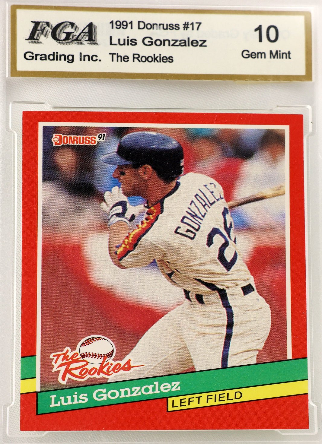 A 1991 Donruss Luis Gonzalez baseball trading card graded and encapsulated by FGA as a 10 Gem Mint. The card shows Gonzalez in a batting stance, wearing a white uniform with navy blue lettering and numbers, set against a red and green border with a gold FGA label at the top.