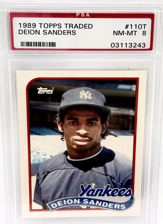 A 1989 Topps Deion Sanders baseball trading card graded and encapsulated by PSA. The card is numbered #110T and features a portrait of Deion Sanders in a New York Yankees uniform, sealed inside a clear plastic PSA slab with a red graded header card.
