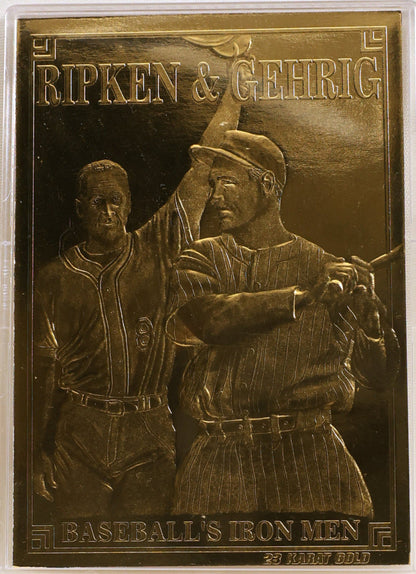 A rectangular bronze-toned commemorative plaque featuring two baseball players, with raised text reading 'RIPKEN & GEHRIG' at the top and 'BASEBALL'S IRON MEN' at the bottom. The plaque is displayed in a clear plastic protective case against a light neutral background.