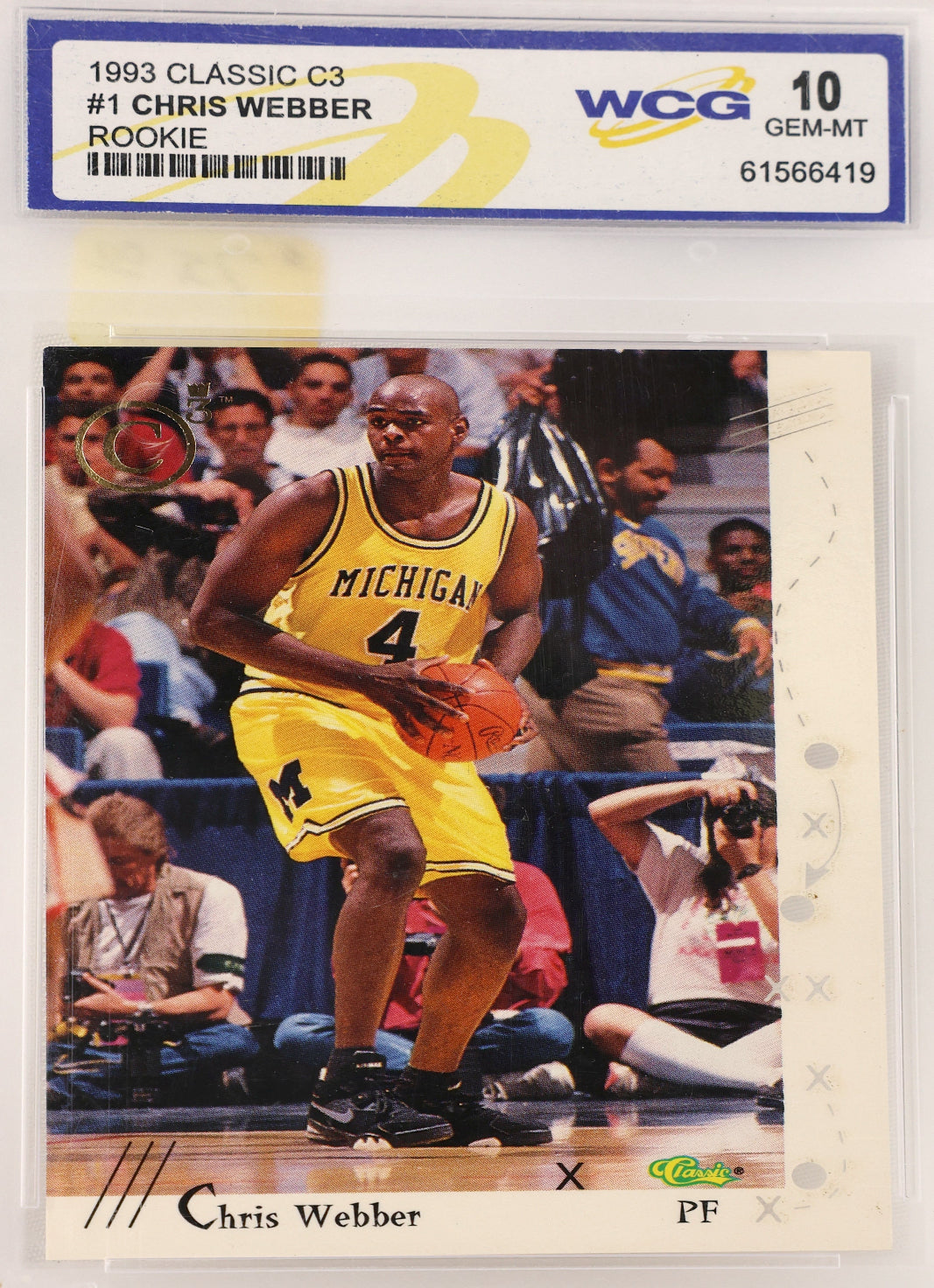 A 1993 Classic C3 Chris Webber basketball trading card graded and encapsulated by WCG, showing Webber in a yellow Michigan jersey on a court, with the WCG label visible at the top.