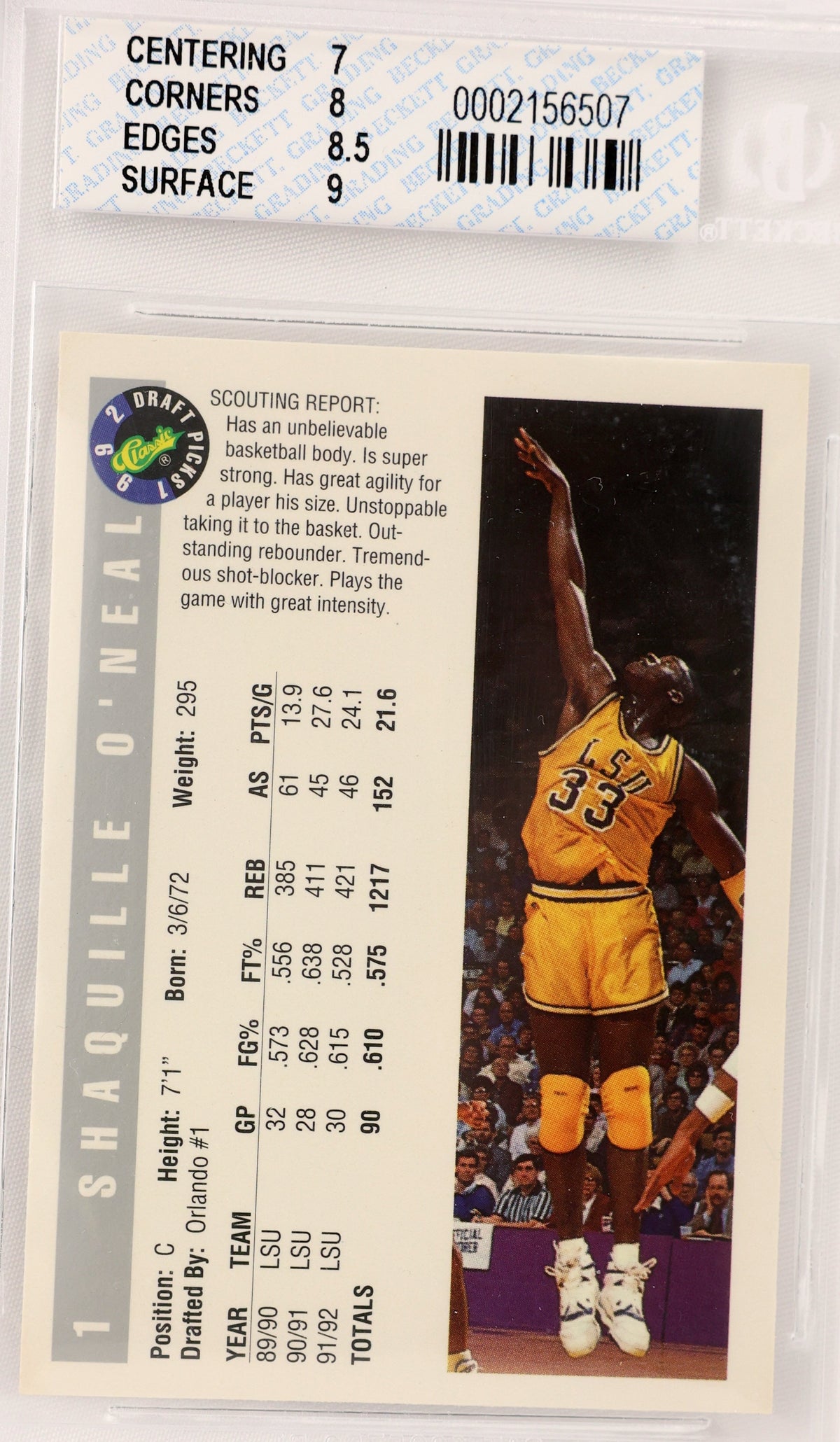 A vintage basketball trading card of Shaquille O'Neal from the 1991-1992 season, graded and sealed in a clear plastic protective slab with a header card. The card features a scouting report on the left and a photo of O'Neal in a yellow Lakers jersey on the right.