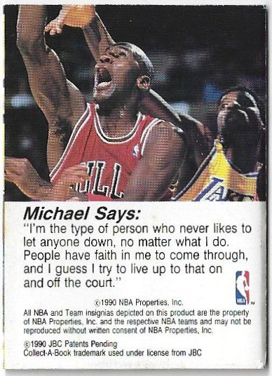 A collectible 1990 NBA trading card featuring Michael Jordan in a red Chicago Bulls jersey, with a quote from 'Michael Says' printed below on a white background.