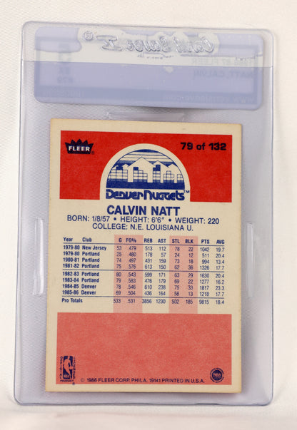 A vintage Fleer Calvin Natt basketball trading card, graded and encapsulated in a clear plastic protective holder. The back of the card features a red header with the player's profile and a peach-colored data table at the bottom.