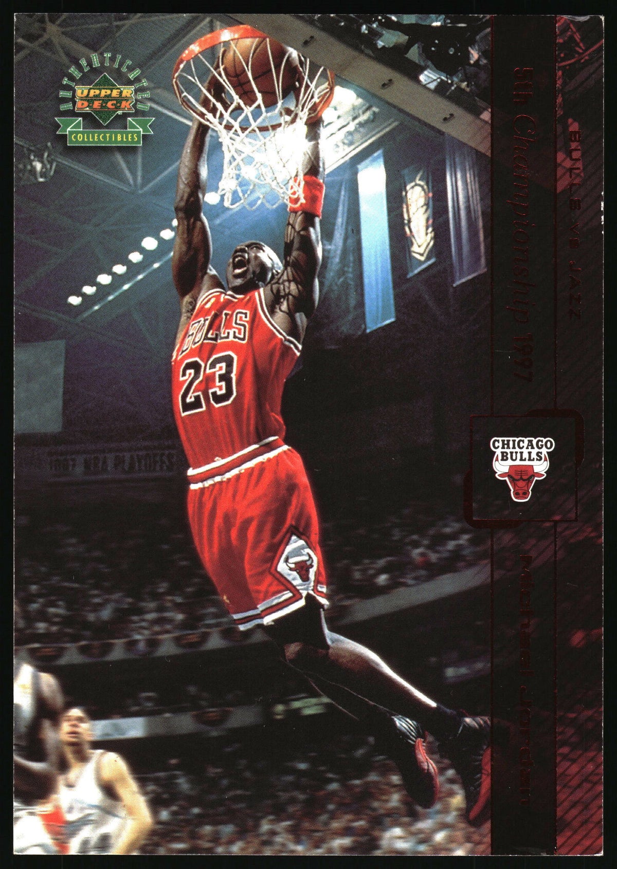 A vintage 1997 Upper Deck Chicago Bulls Michael Jordan basketball trading card, featuring Jordan mid-dunk in his red number 23 jersey inside a crowded arena.