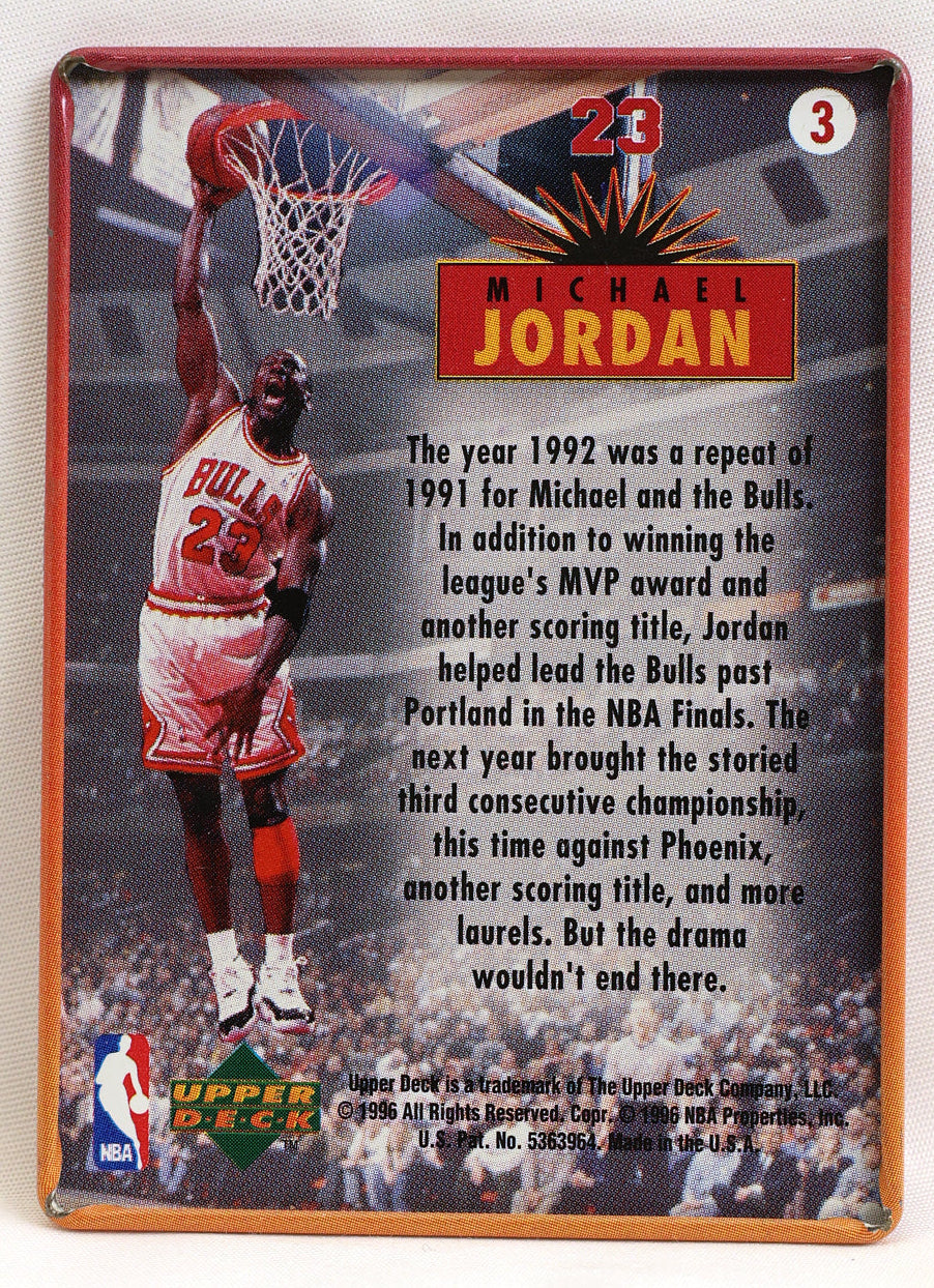 A vintage-style basketball trading card featuring Michael Jordan in a red and white Chicago Bulls uniform, with the number 23 and a red banner reading Michael Jordan. The card includes a block of text about his 1992 season and an Upper Deck logo at the bottom.