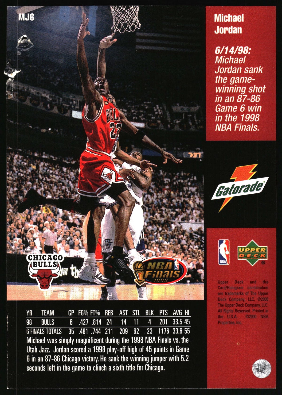 A vintage 1998 NBA trading card featuring Michael Jordan in a Chicago Bulls uniform, with team and player statistics on the left and a red player info panel on the right. Visible branding includes Gatorade, NBA, and Upper Deck.