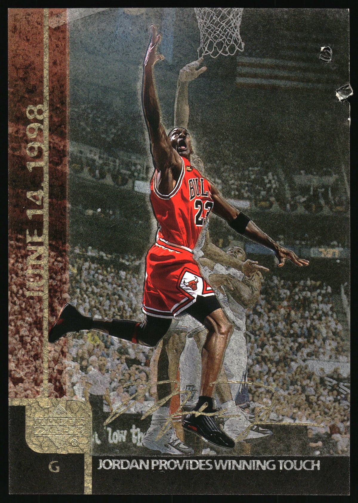 A vintage basketball trading card featuring Michael Jordan in a red Chicago Bulls jersey mid-dunk, with a textured gold border, vertical text reading 'JUNE 14 1998', and an arena background.